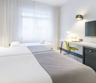 Camera doppia + letto suppletorio Hotel ILUNION Bilbao Camera doppia + letto suppletorio Hotel ILUNION Bilbao
