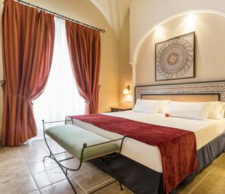 Camera junior suite Hotel ILUNION Mérida Palace Merida